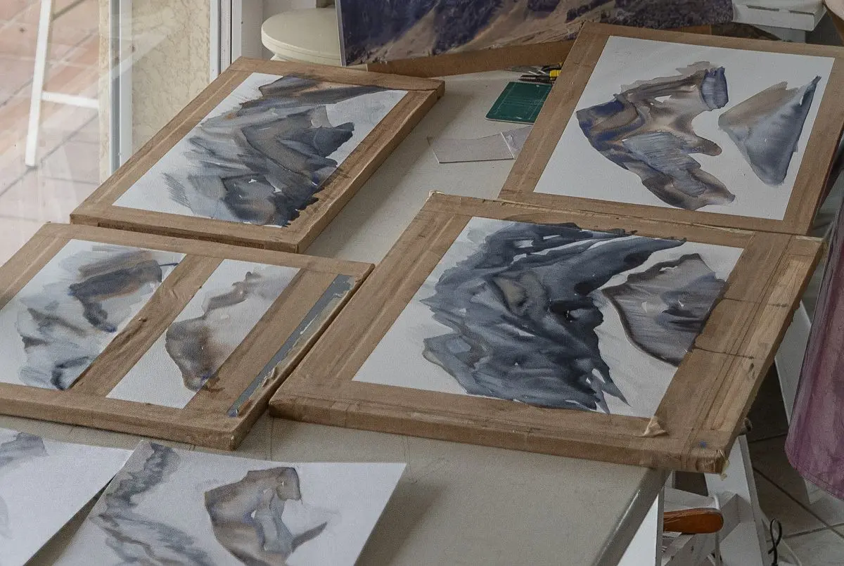 Prue must create 10 paintings to produce 1